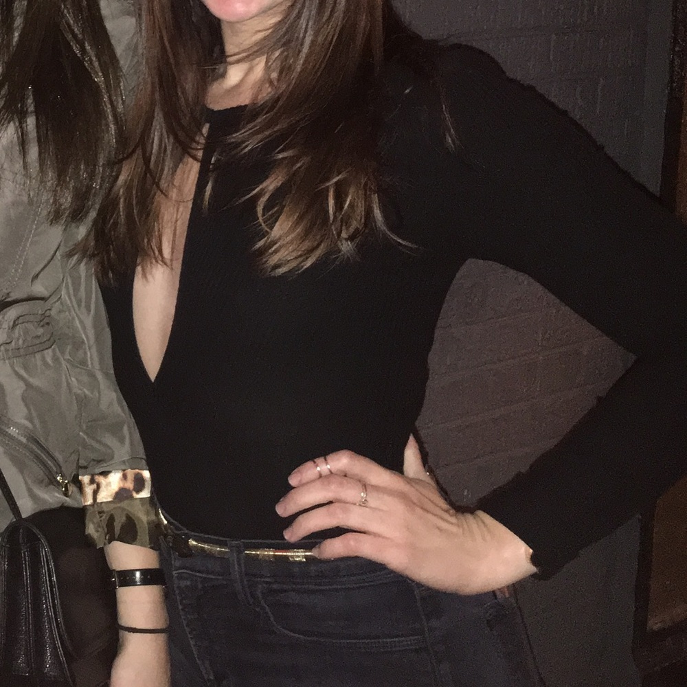 Black bodysuit, deep V